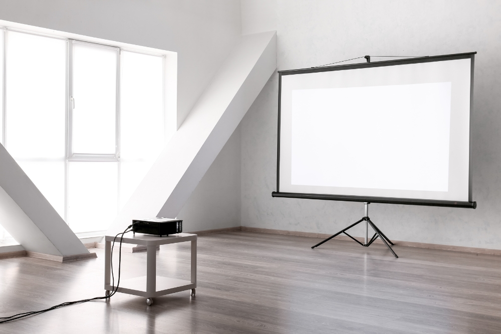 cosy theater room with projector and screen